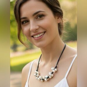 Pearl necklace w/ brown leather